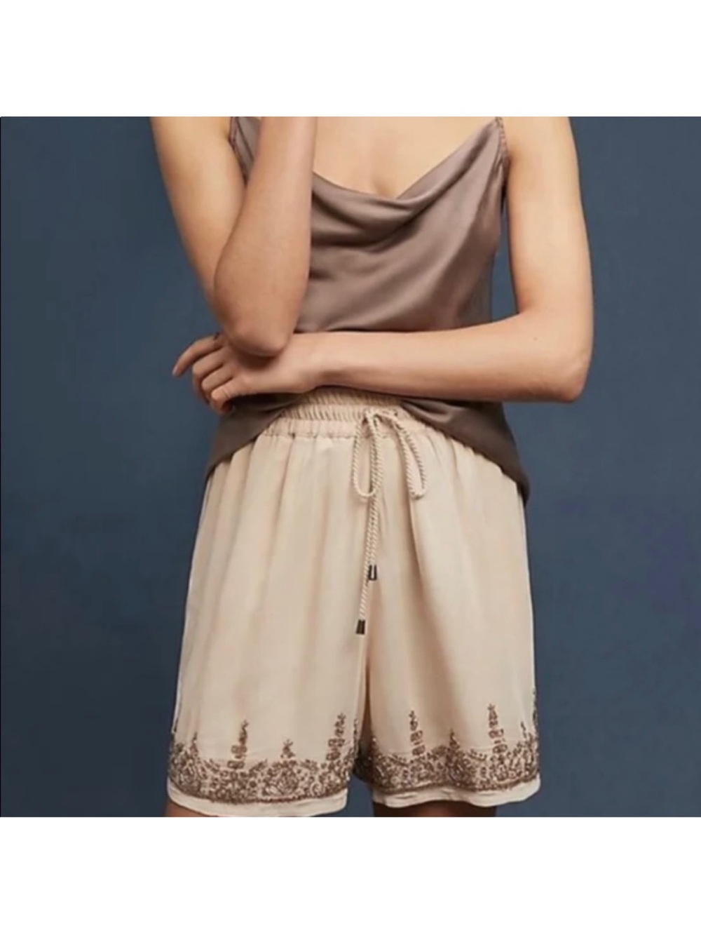Maeve Light Beige  Shorts with bronze embellishment around the bottom